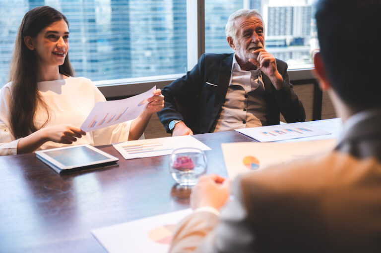 A film production team talking about their budget.